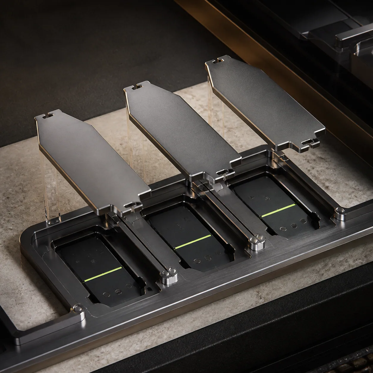 Concept render of three blank brand plates aligning with indexed chassis slots